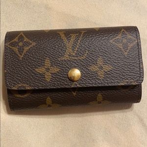 SOLD Authentic Louis Vuitton key holder.